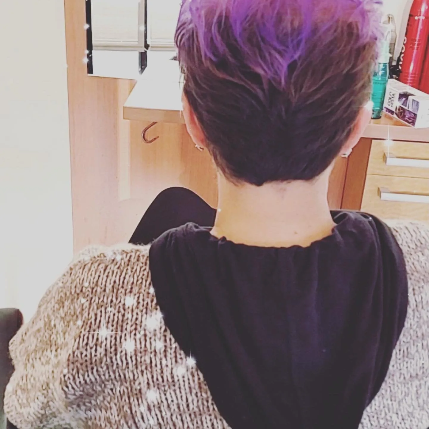 Long layered women's haircut at Salon Sanaa