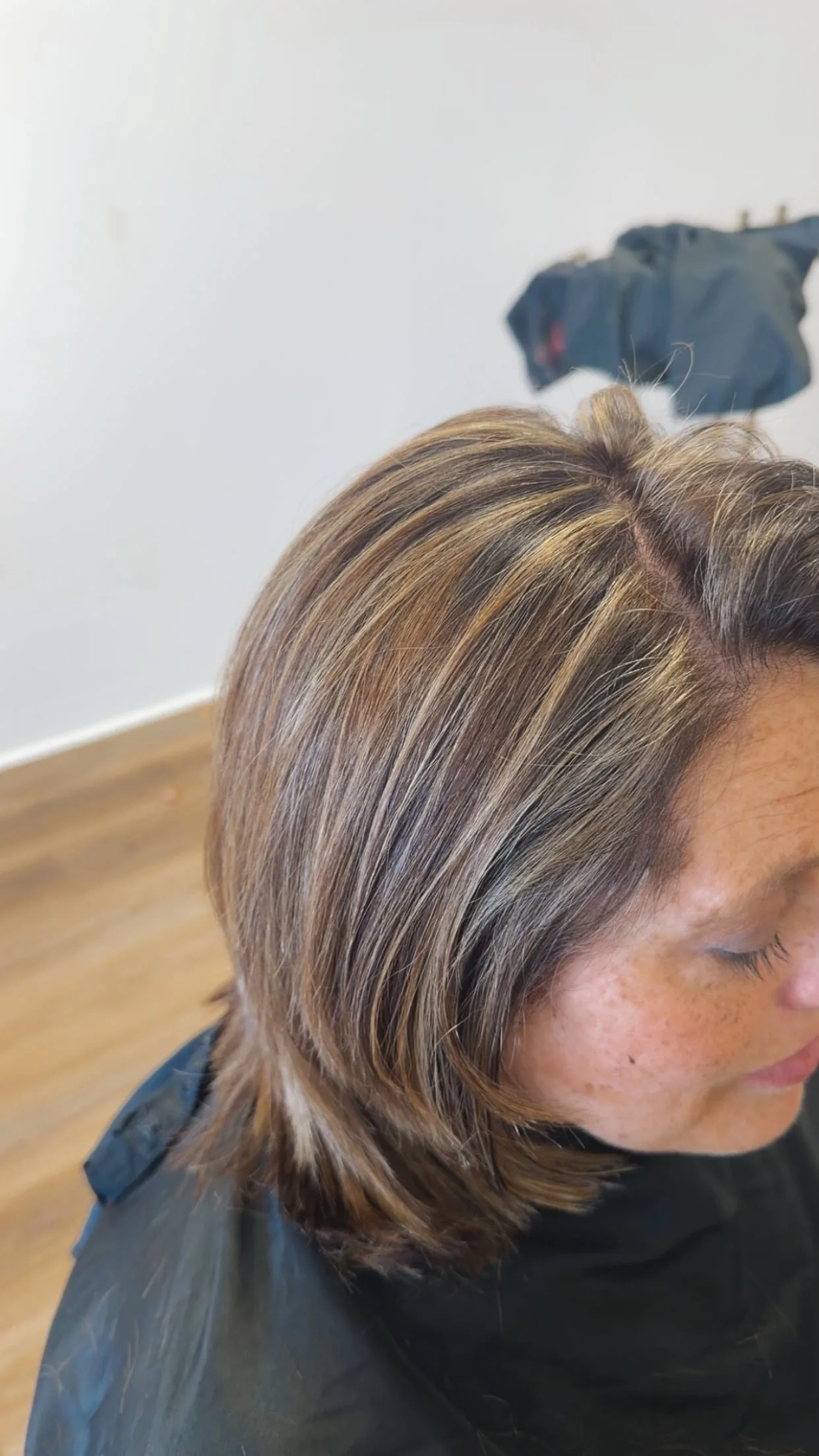 Cool partial highlights framing the face at Salon Sanaa