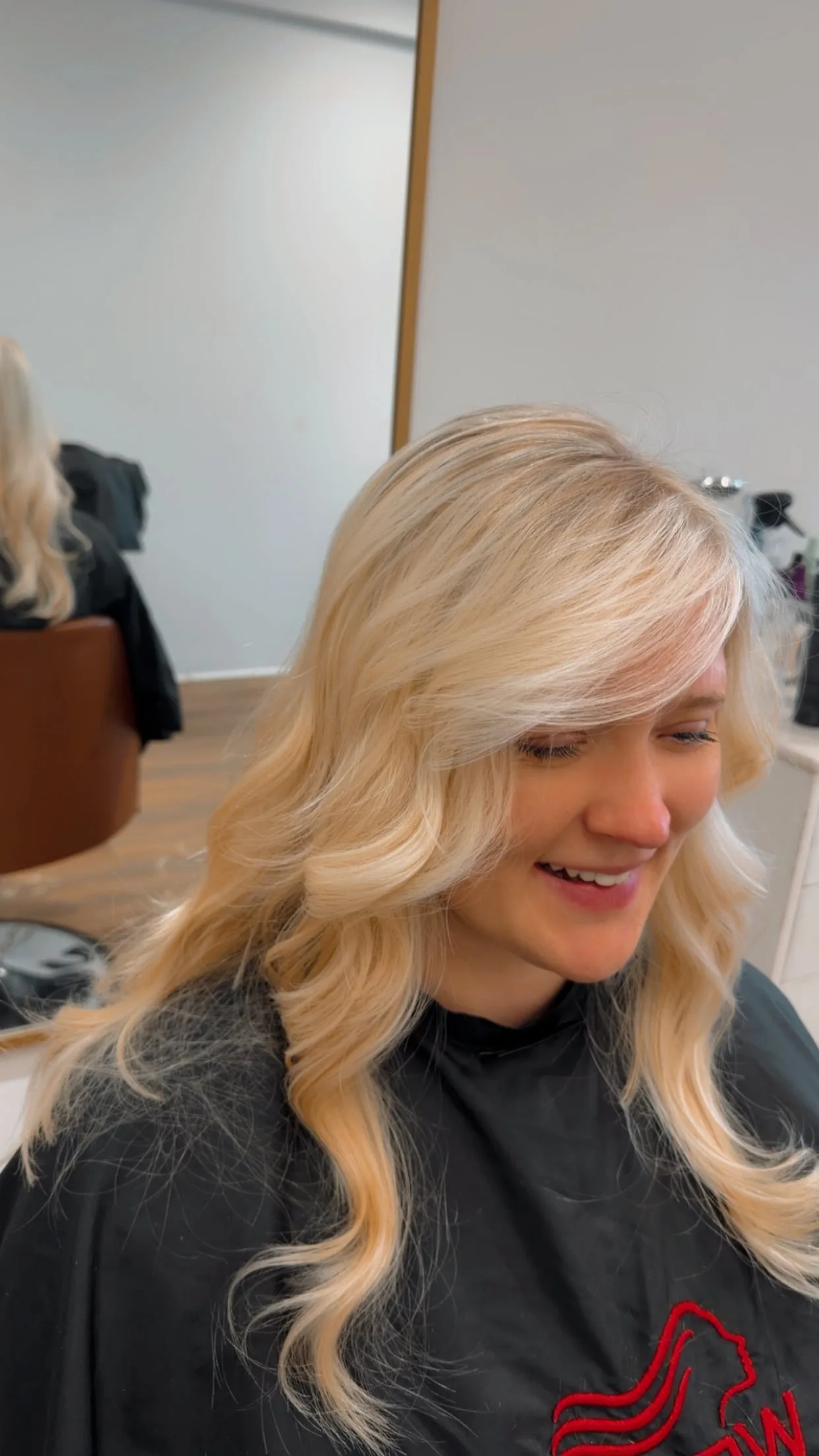 Dark brown root touch up result with seamless blend at Salon Sanaa