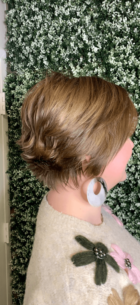 Stylist monitoring partial highlight foils at Salon Sanaa in Farmington Hills