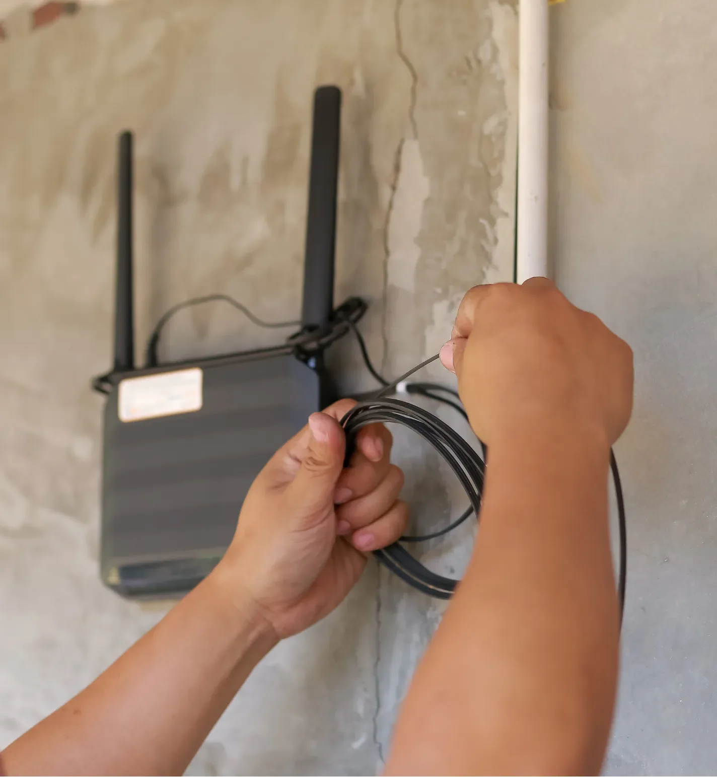 Techmedic GVL technician installing network equipment