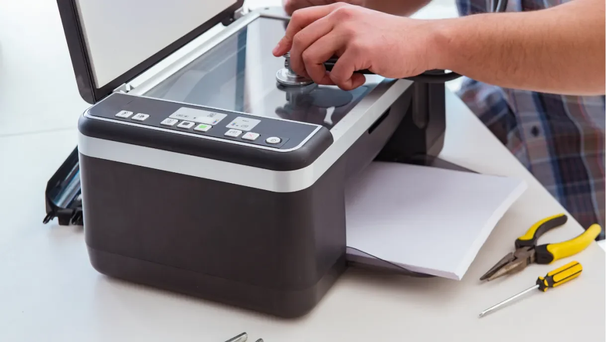 Technician connecting a wireless printer