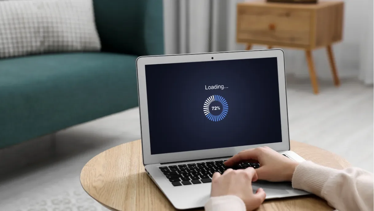 Laptop showing a malware scan in progress